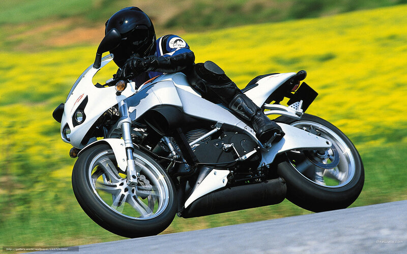 Motorcycle Rider on Road — White