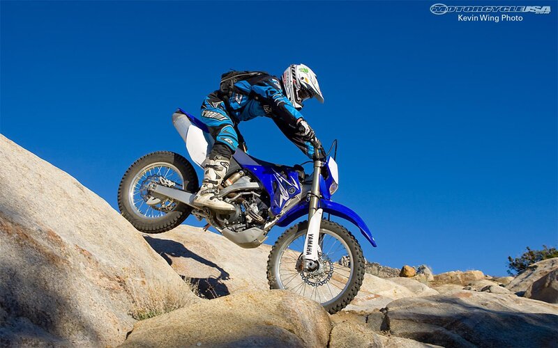 Motorcycle rider on rocky terrain