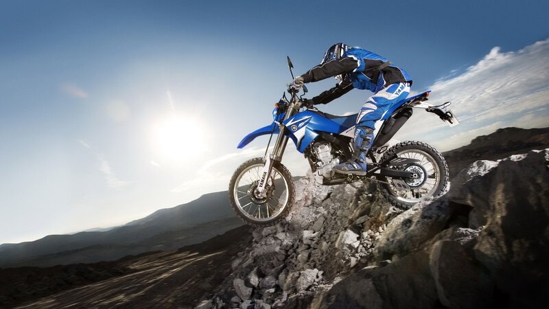 Motorcycle rider on rocky terrain