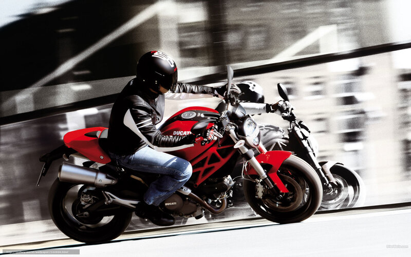 Motorcycle Rider on Street — Red