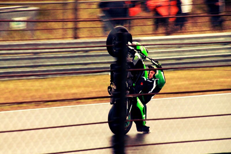 Motorcycle Rider on Track — Green