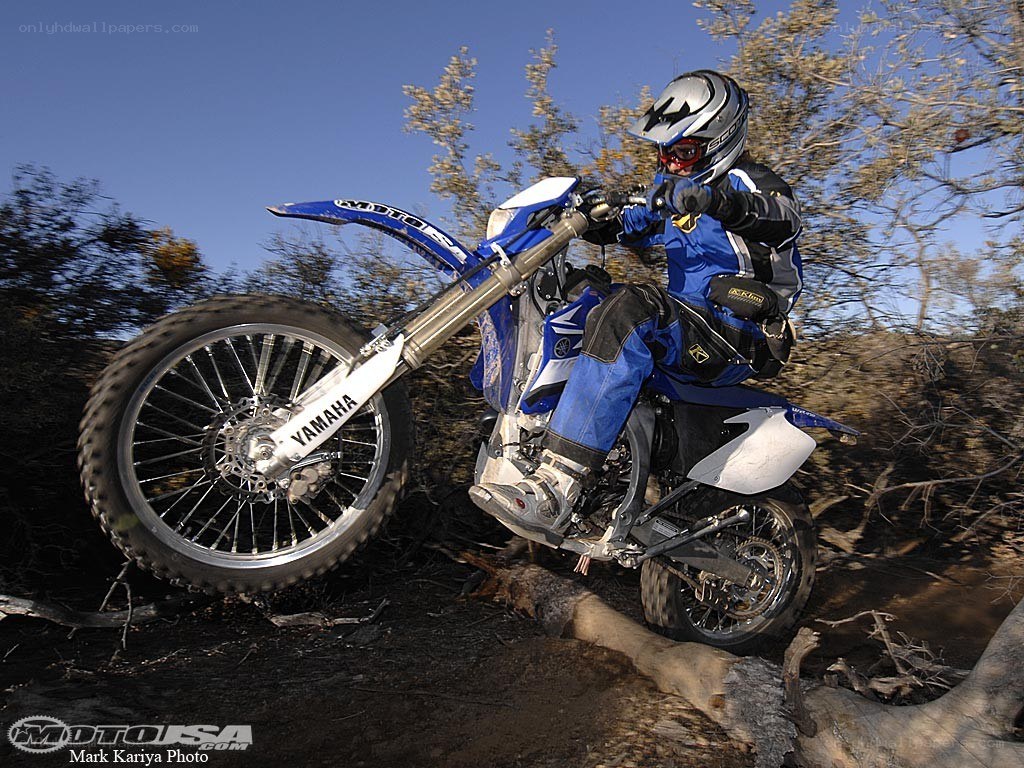 Motorcycle rider on trail