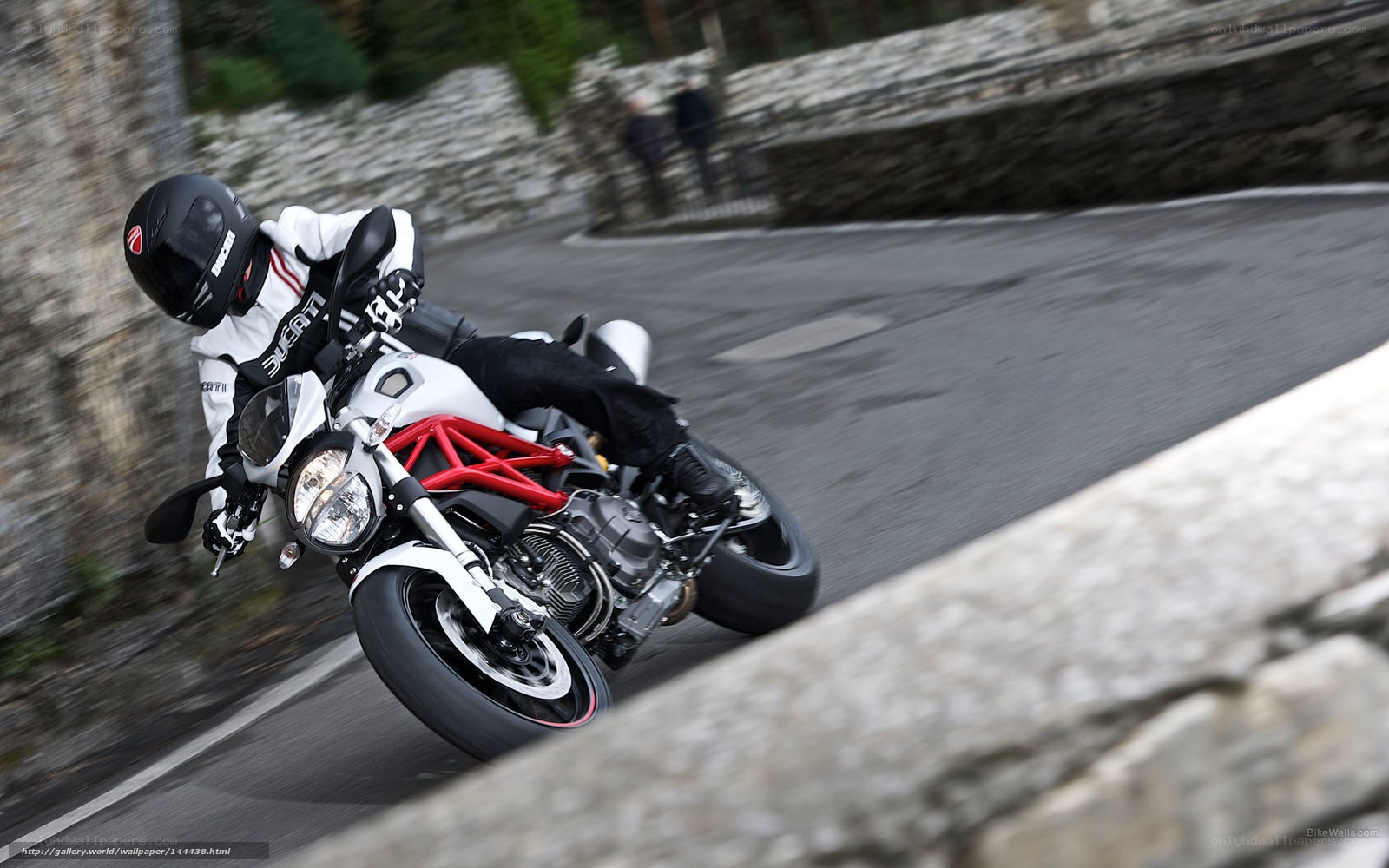 motorcycle rider on winding road
