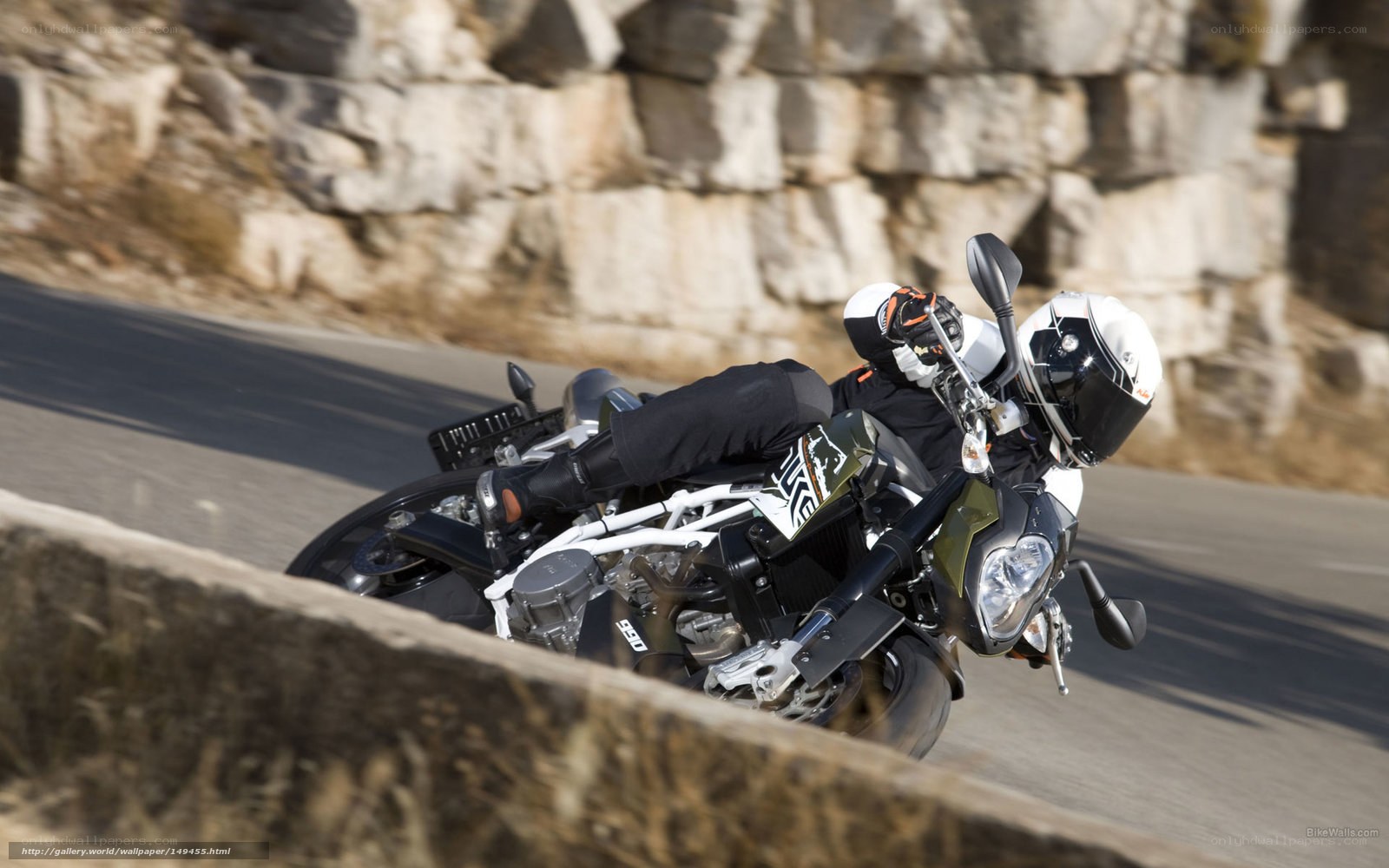 motorcycle rider on winding road