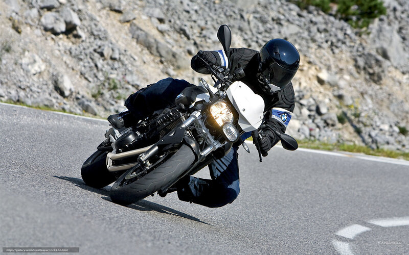 motorcycle rider on winding road