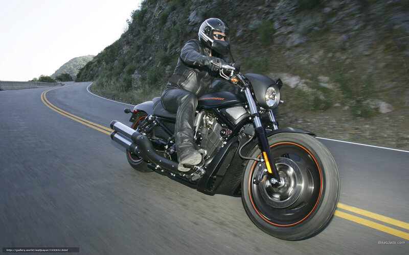 motorcycle rider on winding road