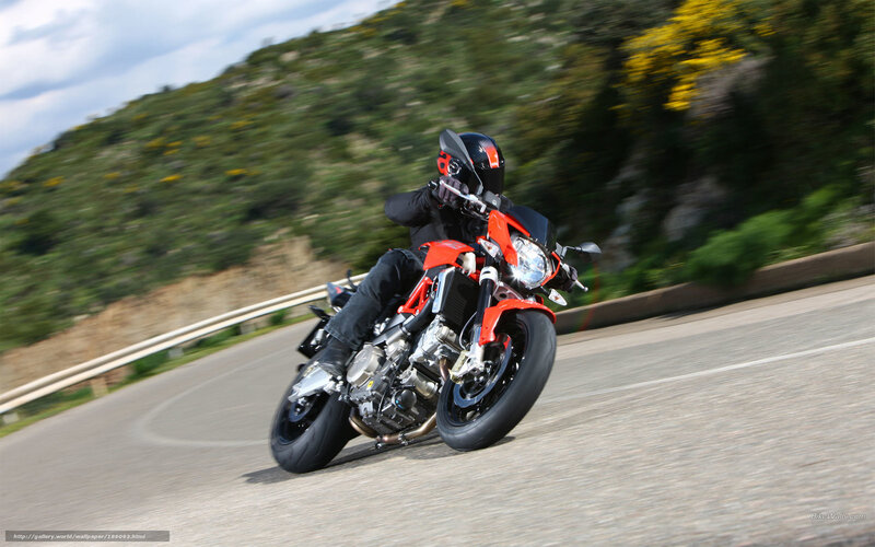motorcycle rider on winding road
