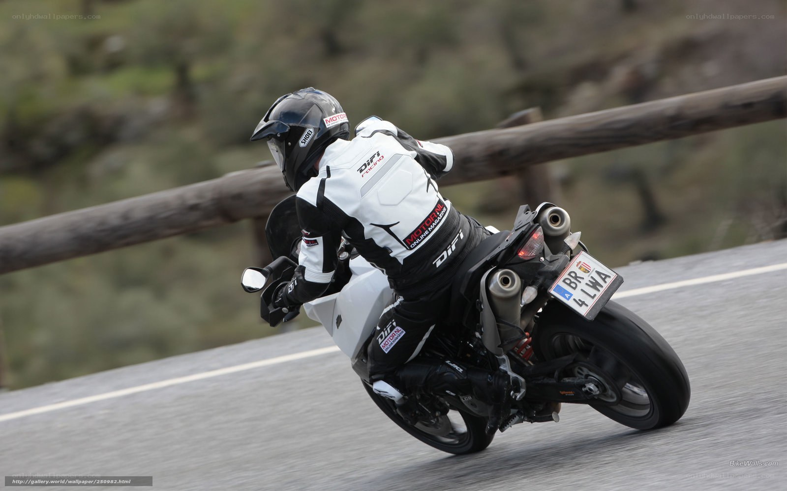 motorcycle rider on winding road