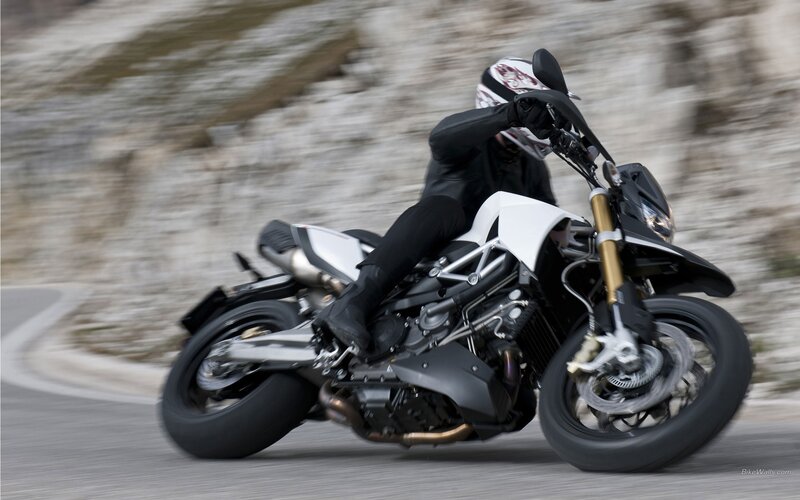 motorcycle rider on winding road