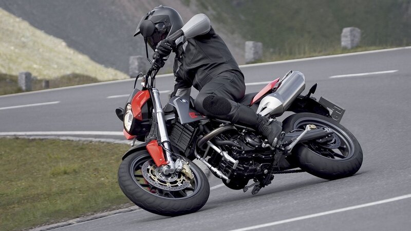 motorcycle rider on winding road