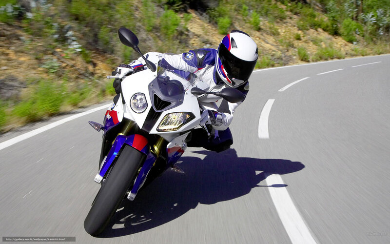 motorcycle rider on winding road