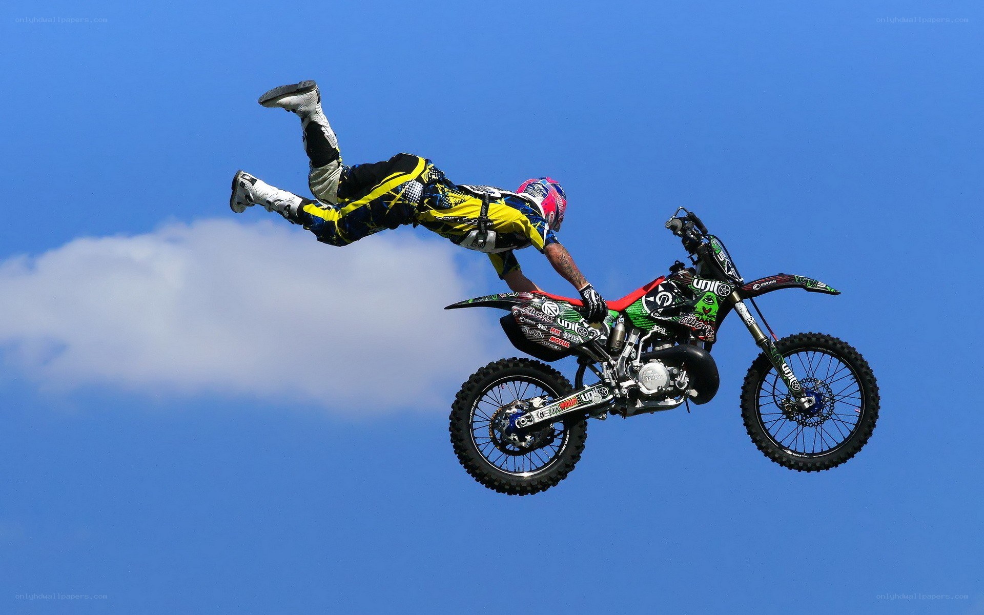 Motorcycle rider performing aerial stunt