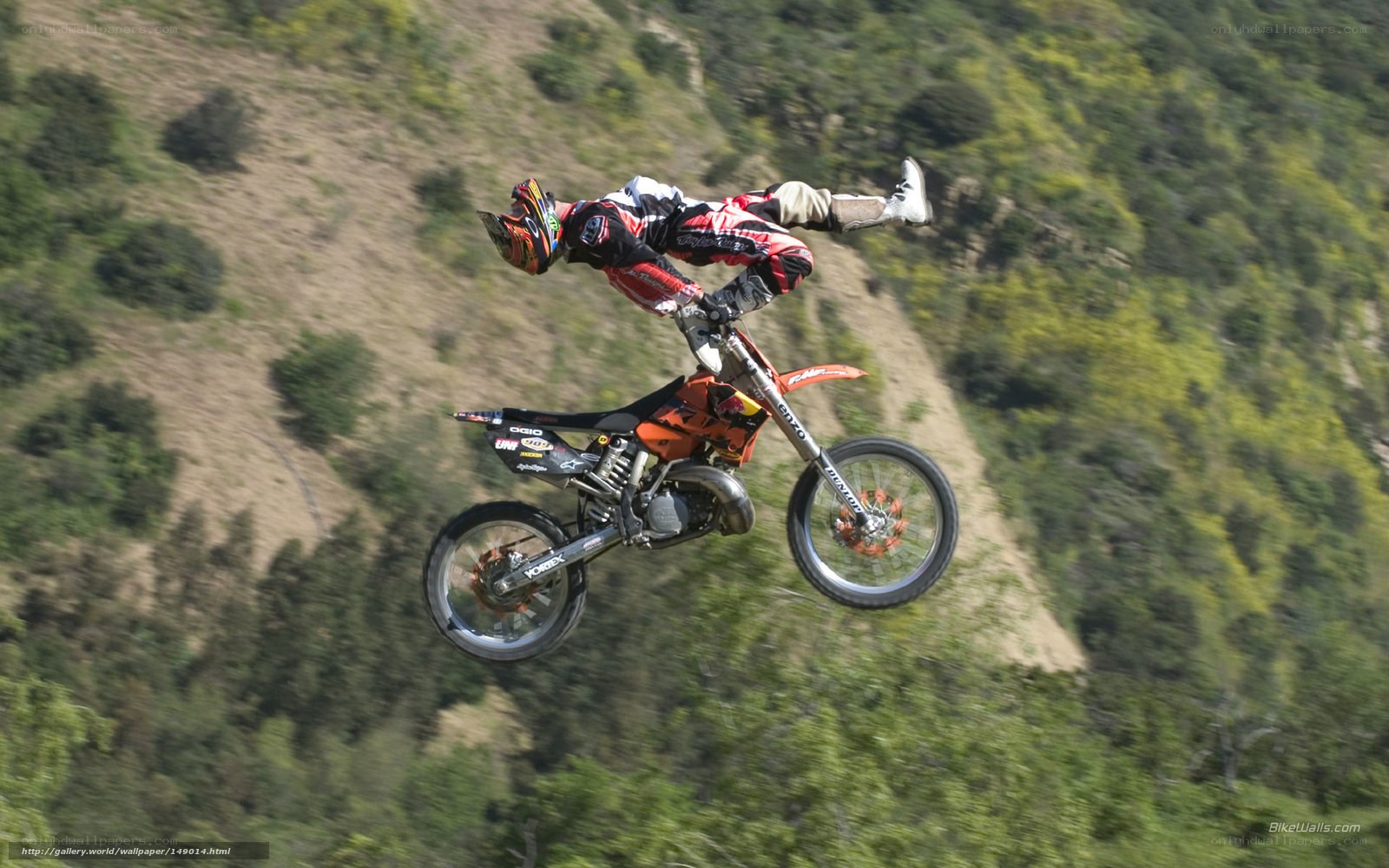 Motorcycle rider performing aerial stunt