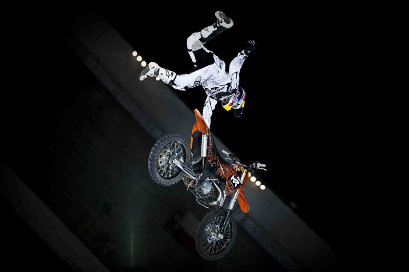 Motorcycle rider performing stunt