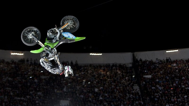 Motorcycle rider performing stunt