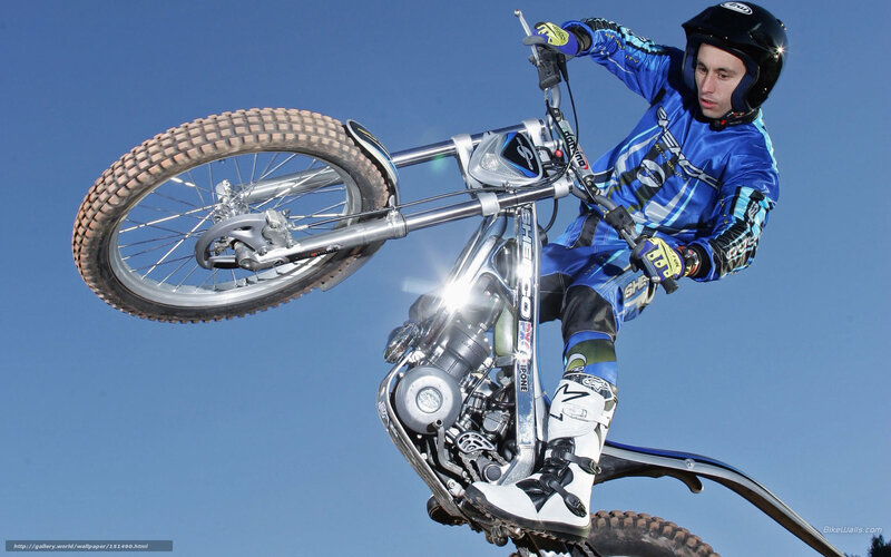 Motorcycle Rider Performing Stunt — Blue
