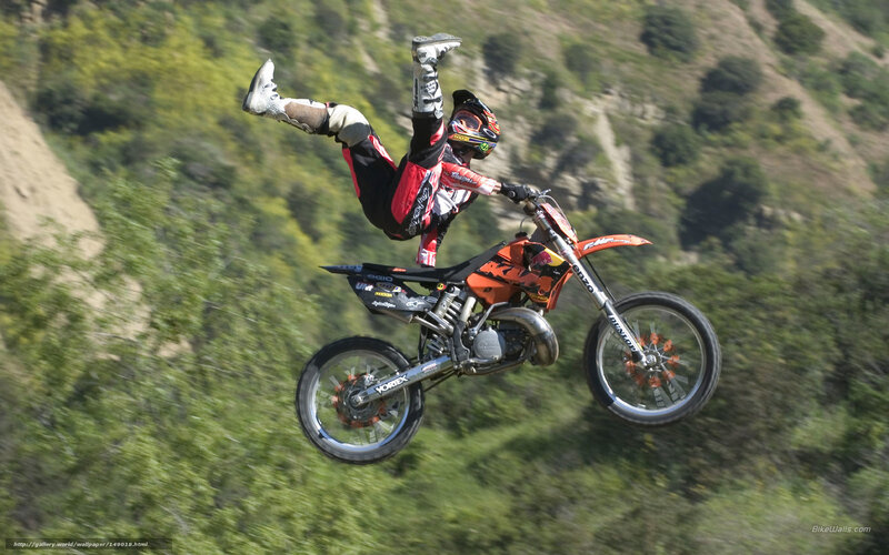 Motorcycle rider performing stunt