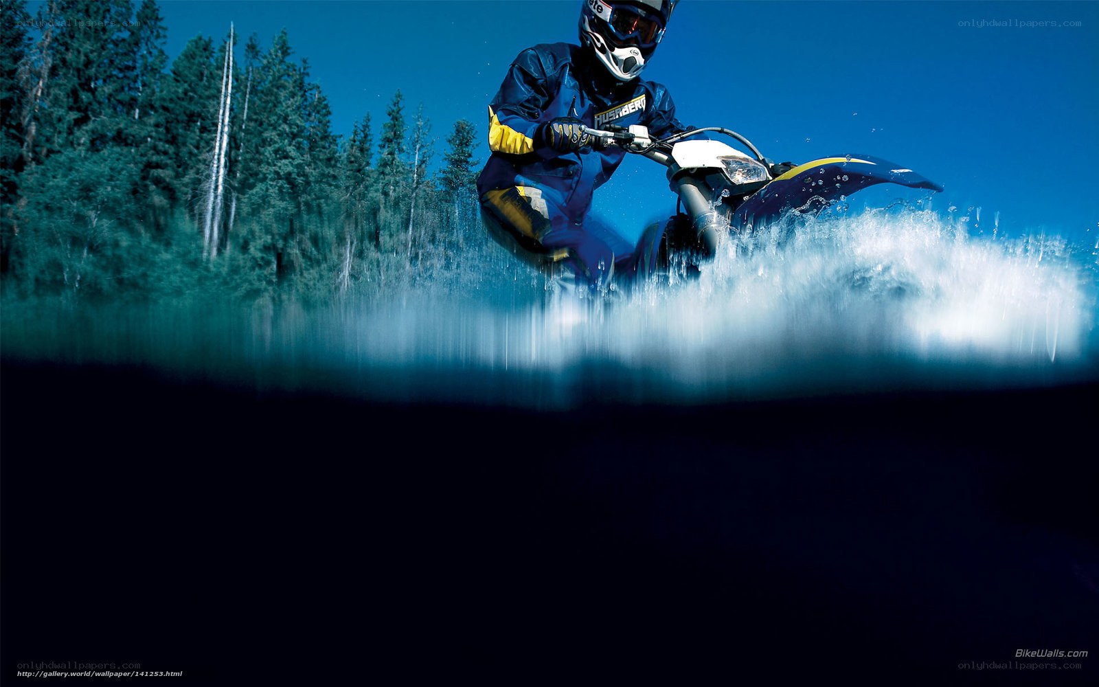 Motorcycle rider splashing water