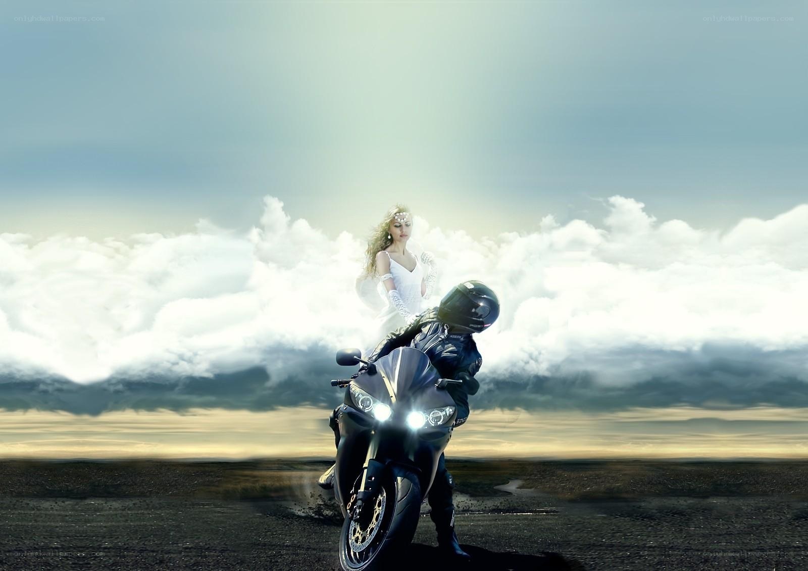 Motorcycle rider with angelic figure