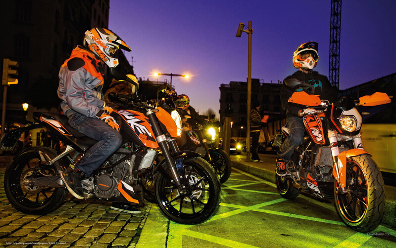 Motorcycle riders at dusk