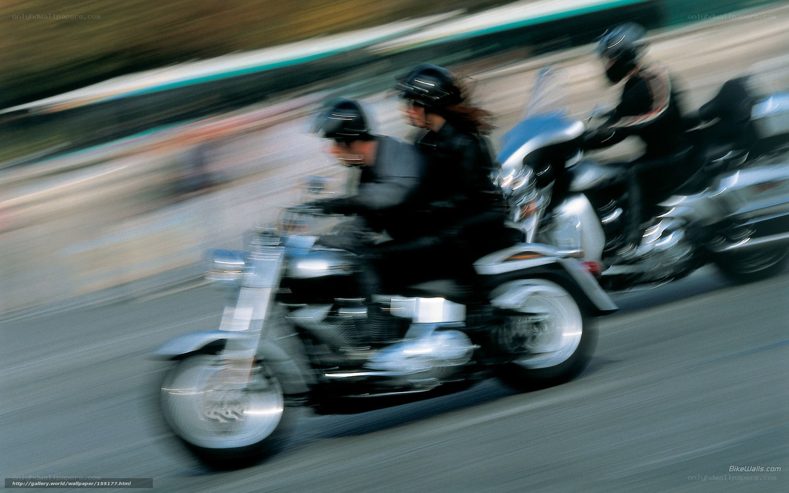 Motorcycle riders in motion