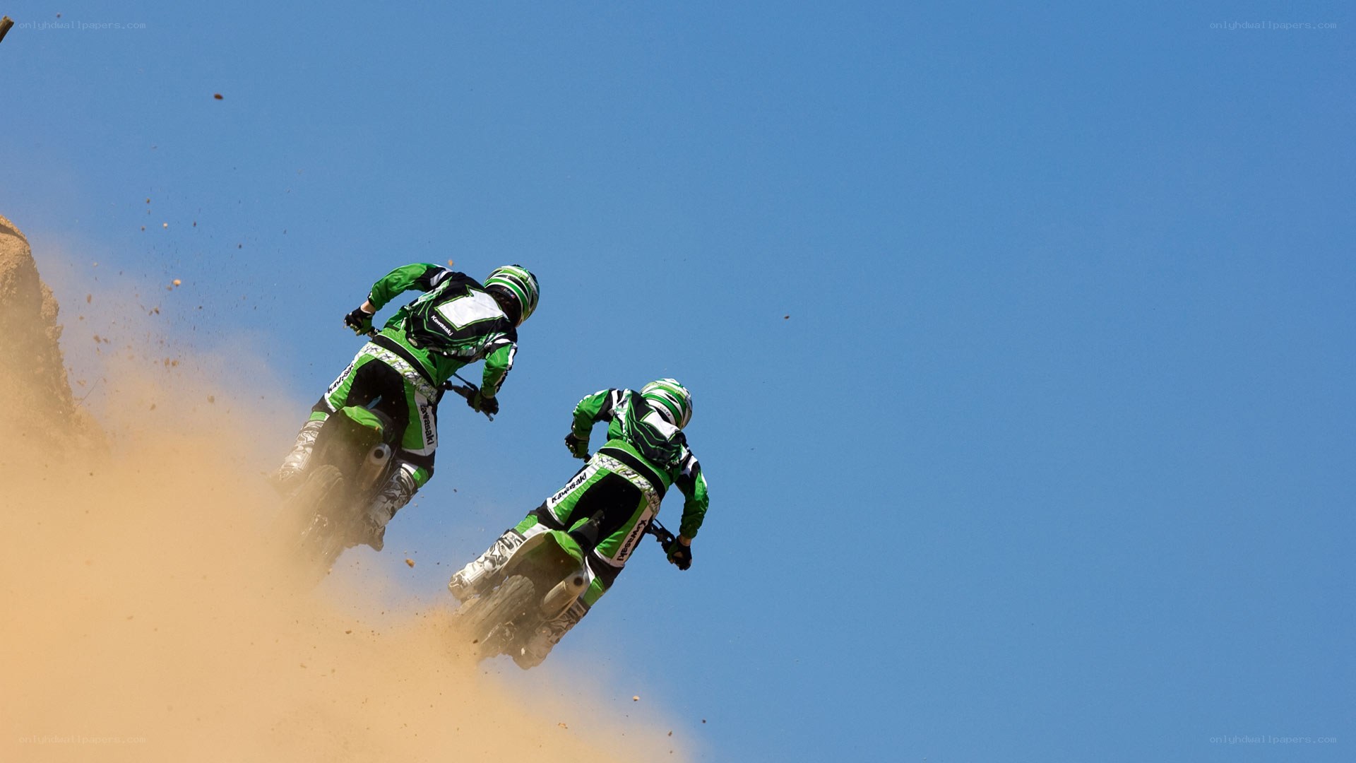 Motorcycle riders on a dirt track