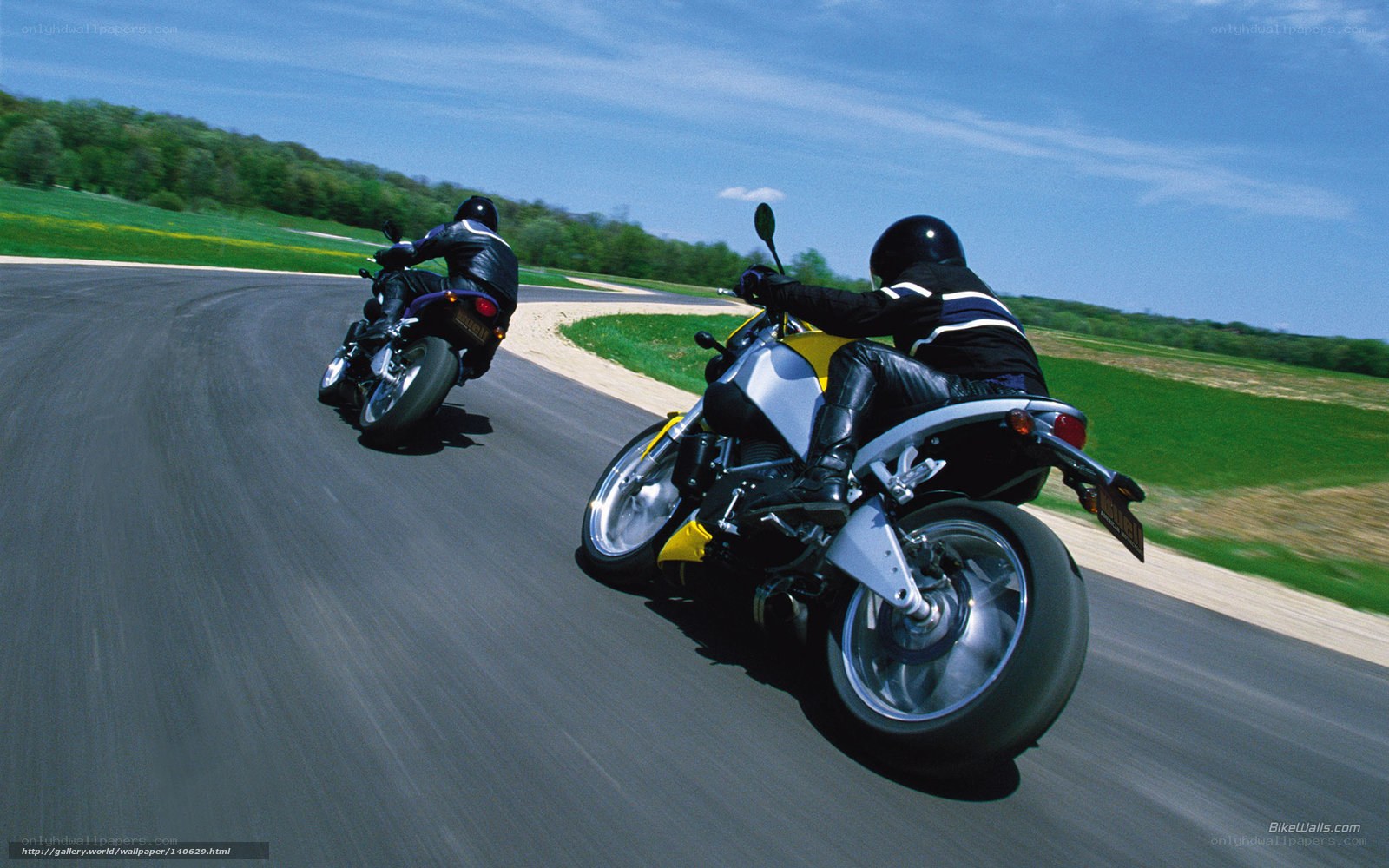 Motorcycle riders on a racetrack