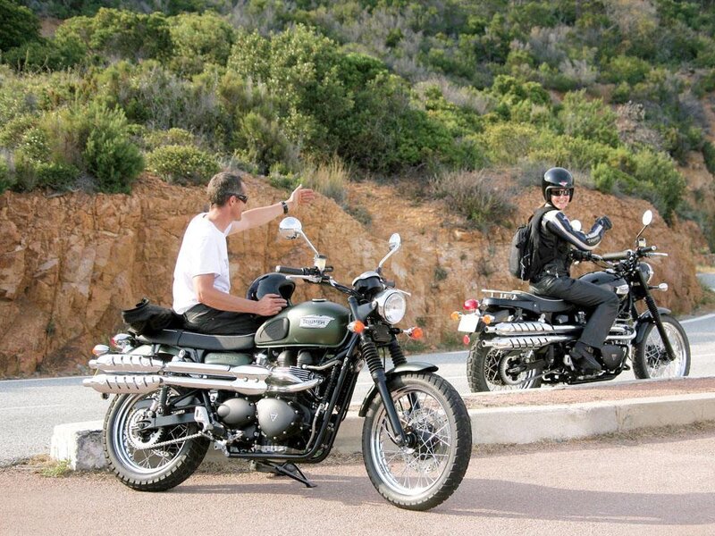 Motorcycle riders on a scenic road
