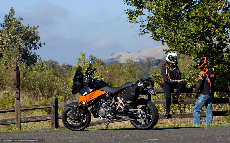 Motorcycle riders on a scenic road