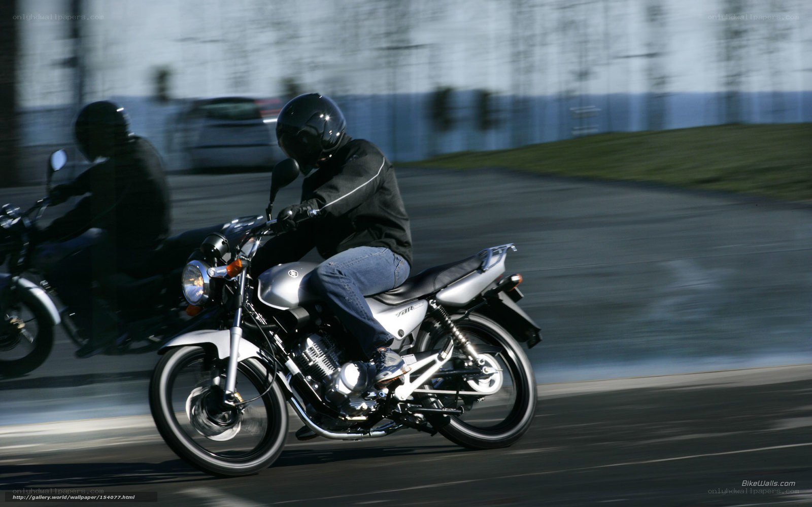 Motorcycle riders on a track