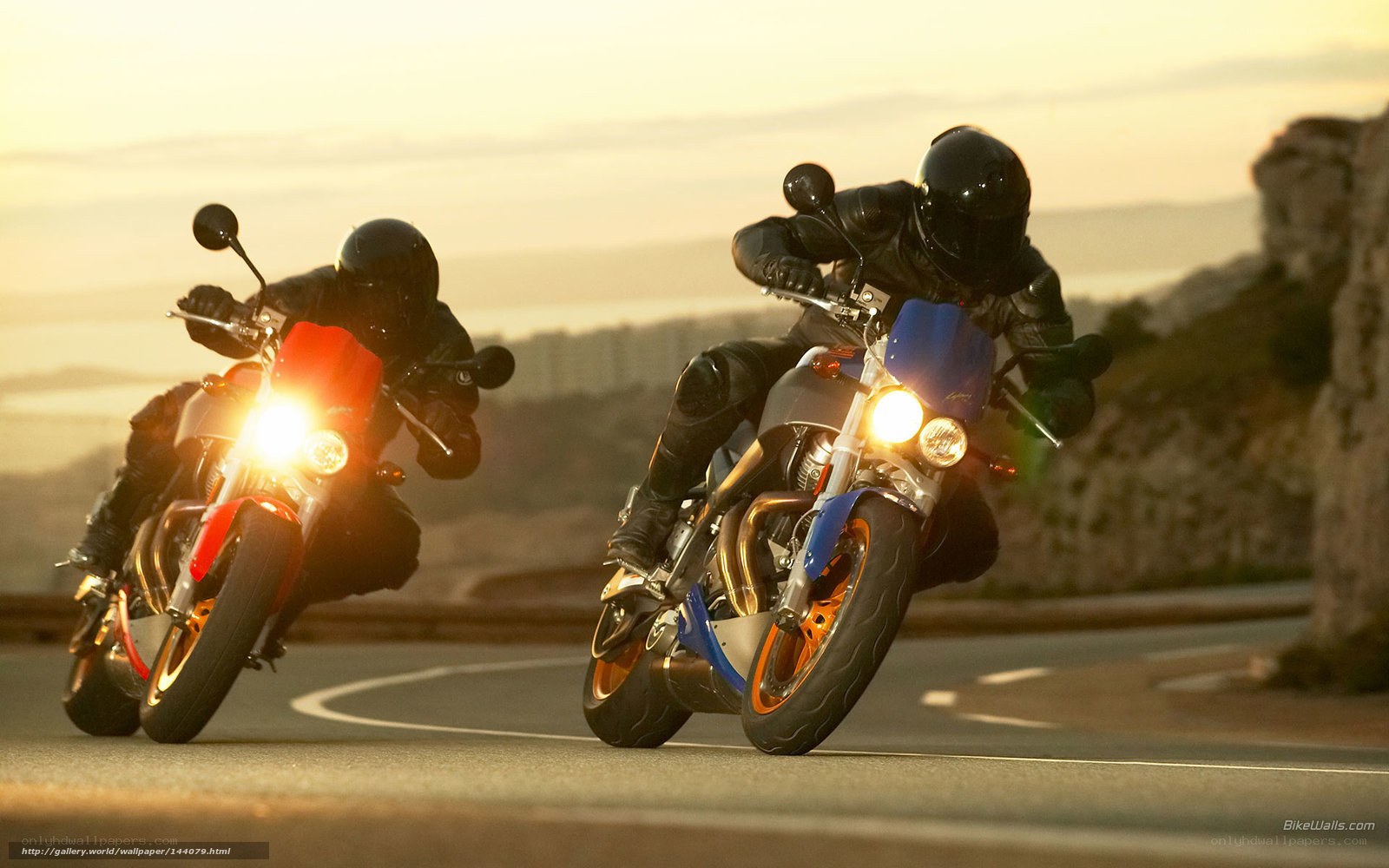 Motorcycle riders on a winding road