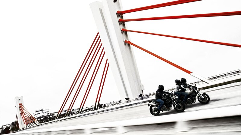 Motorcycle Riders on Bridge — Red, Dynamic