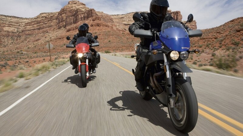Motorcycle riders on desert road