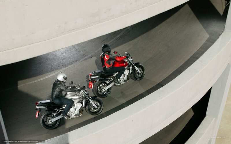 Motorcycle riders on ramp