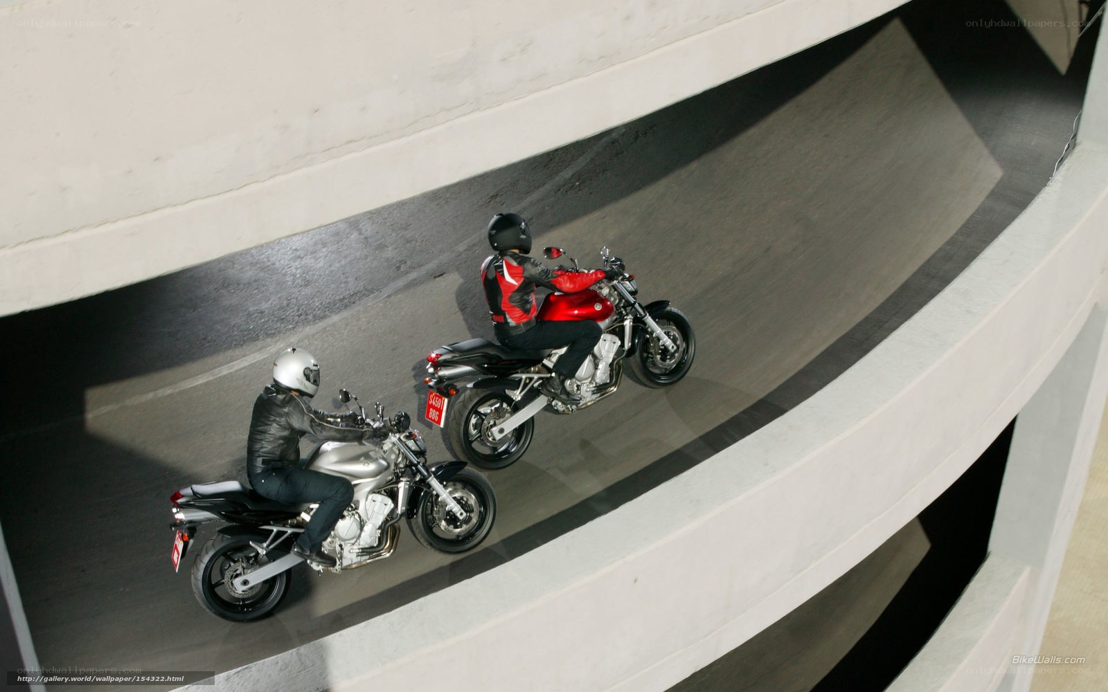 Motorcycle riders on ramp