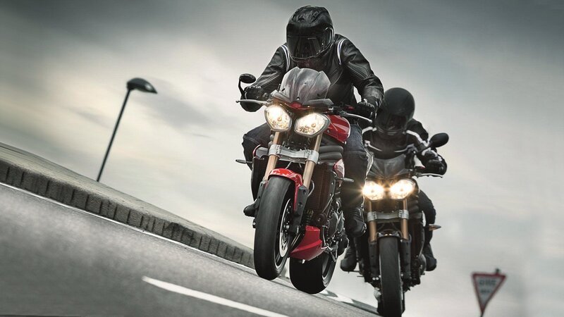 Motorcycle Riders on Road — Gray, Dramatic