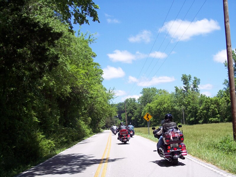 Motorcycle Riders on Road — Green, Calm
