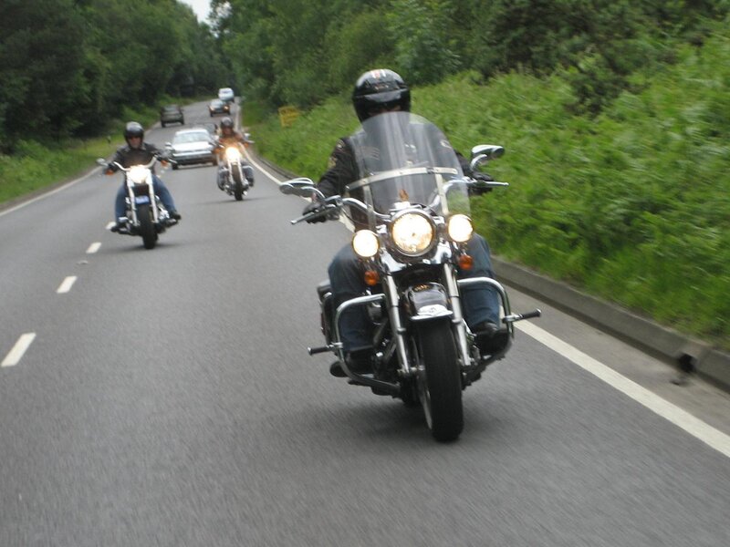 Motorcycle Riders on Road — Green