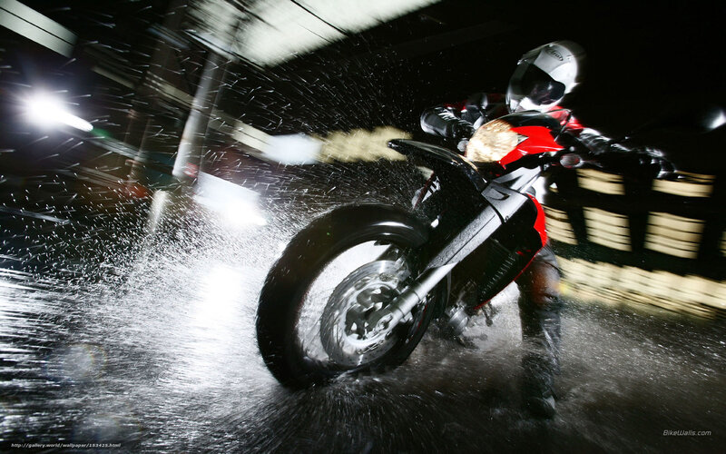 Motorcycle riding in the rain