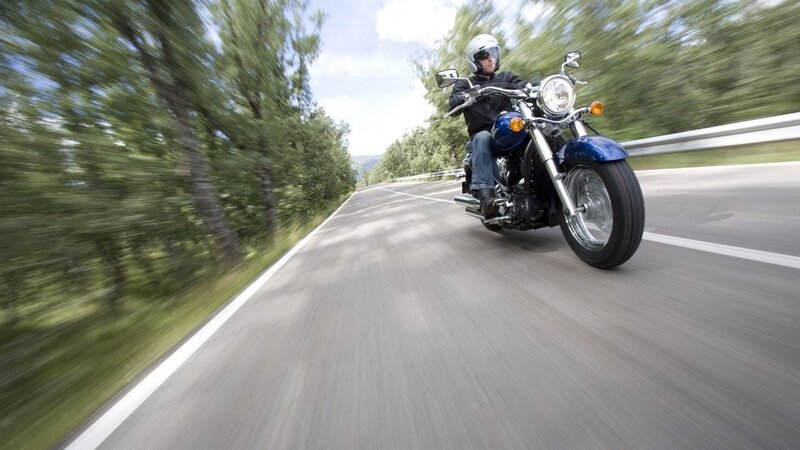 Motorcycle riding on a country road