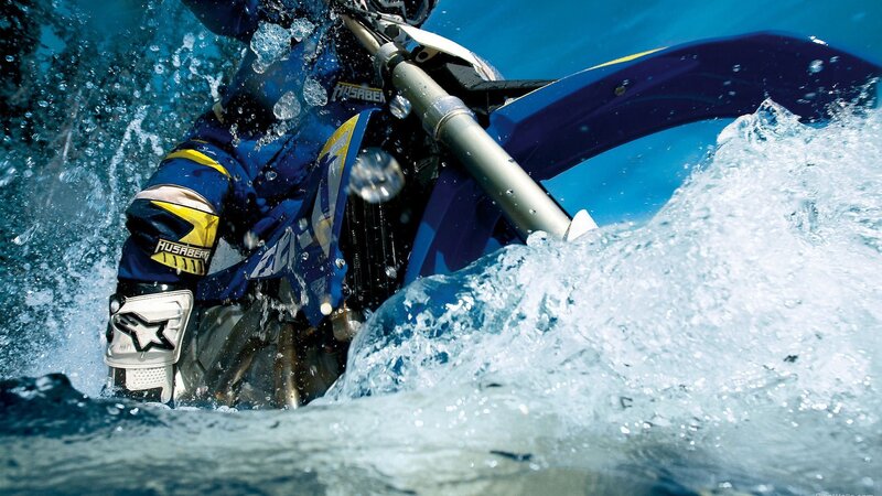 Motorcycle riding through water