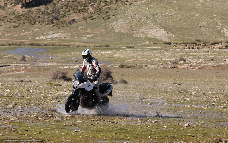 motorcycle riding through water
