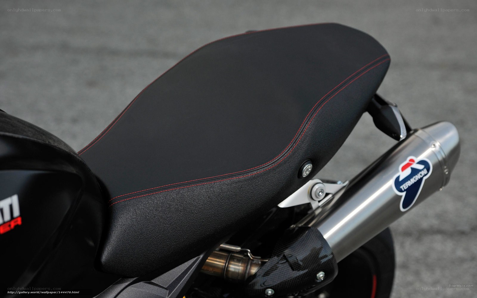motorcycle seat and exhaust