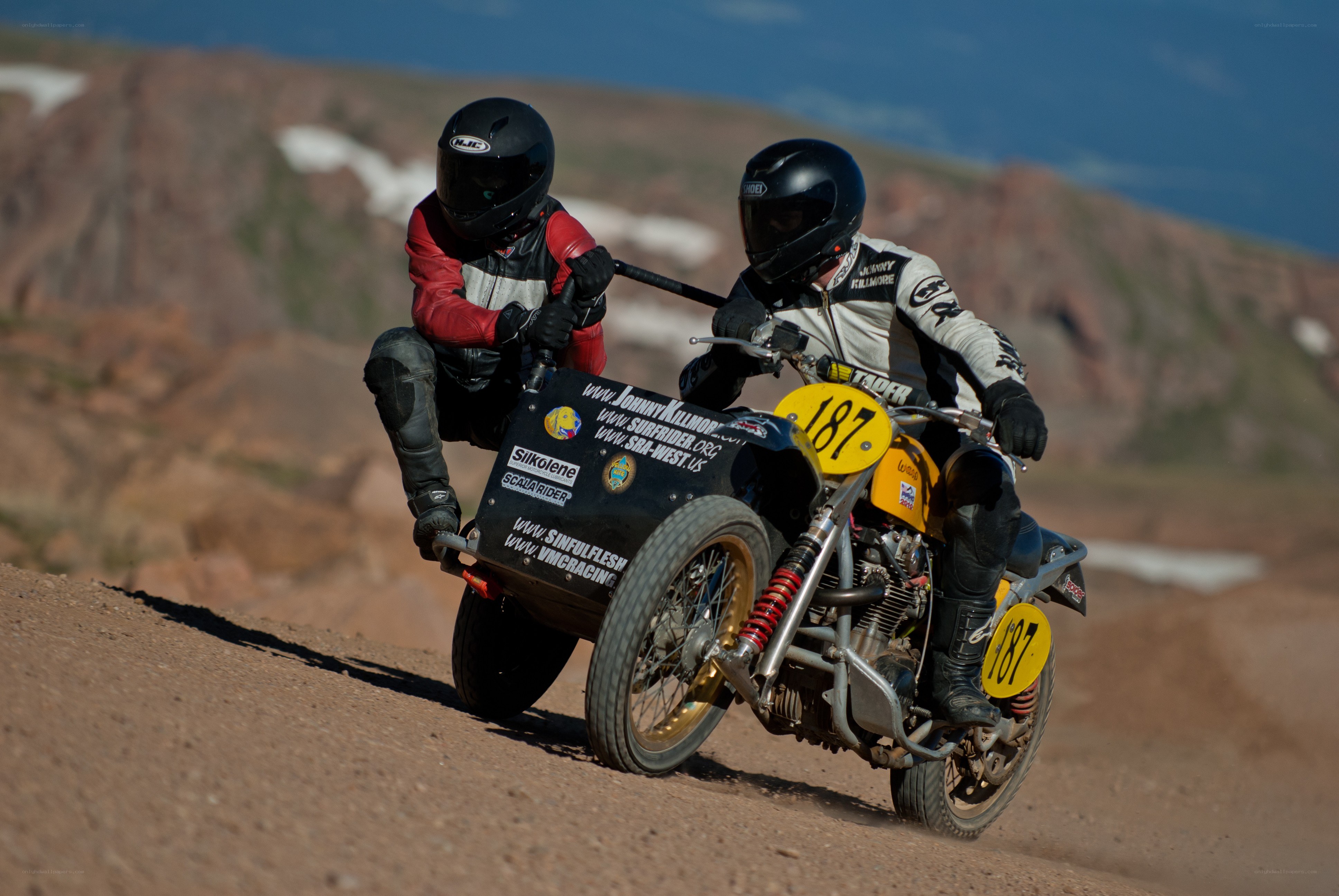 Motorcycle sidecar racing on dirt