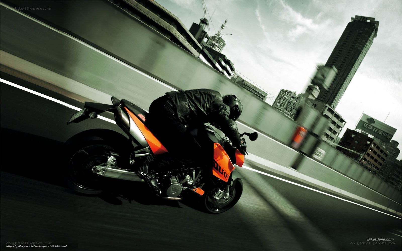motorcycle speeding on city highway
