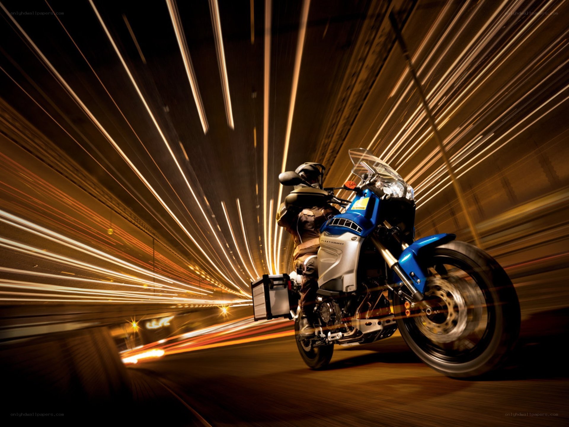 Motorcycle speeding through tunnel