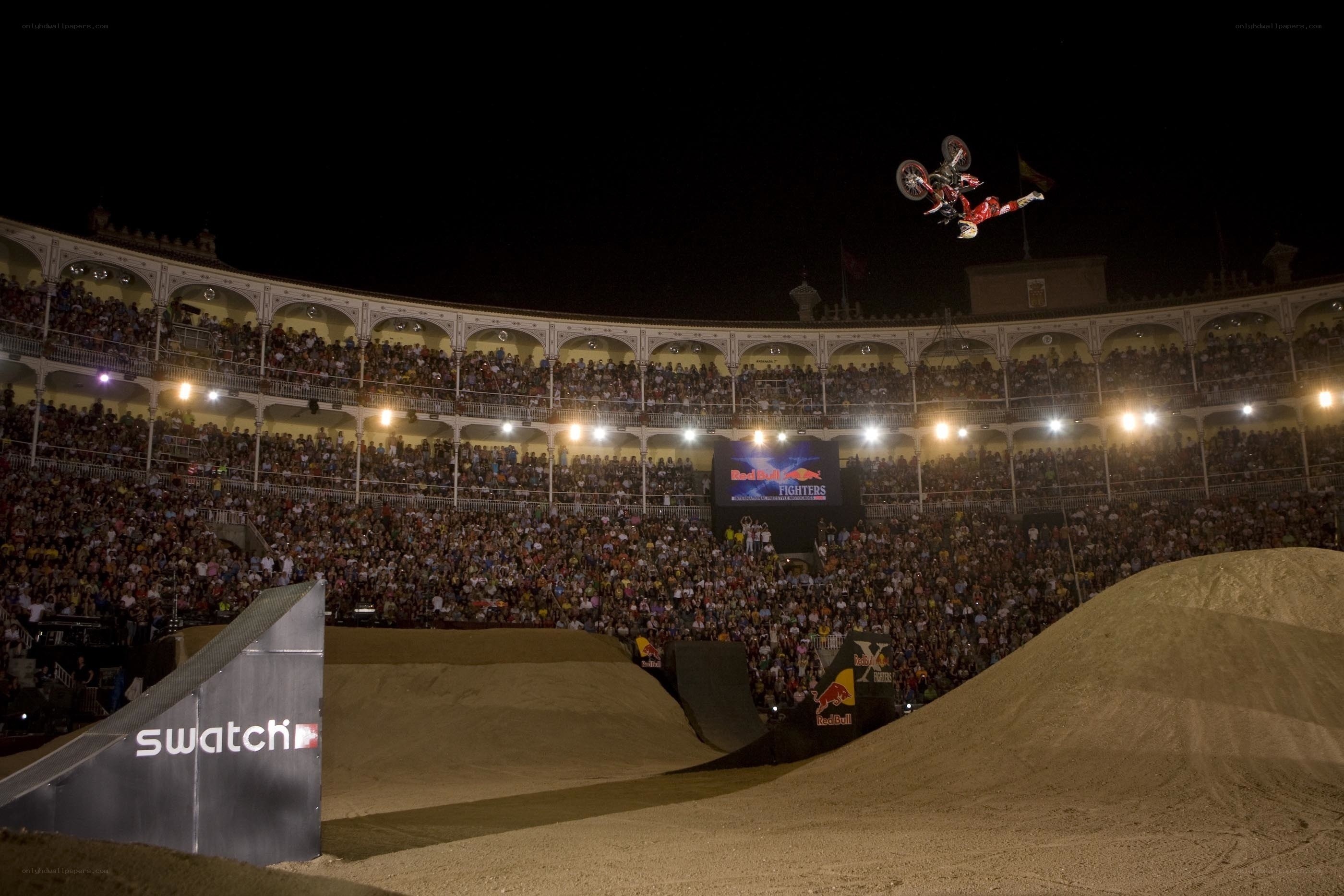 Motorcycle stunt at night event
