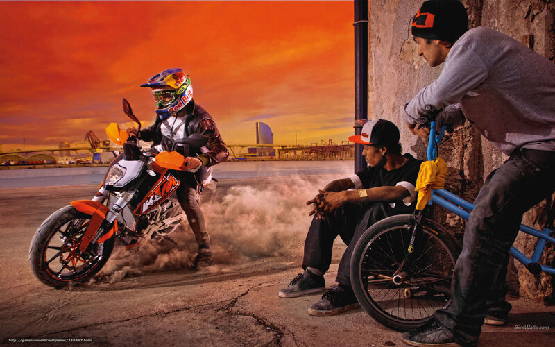 Motorcycle stunt at sunset