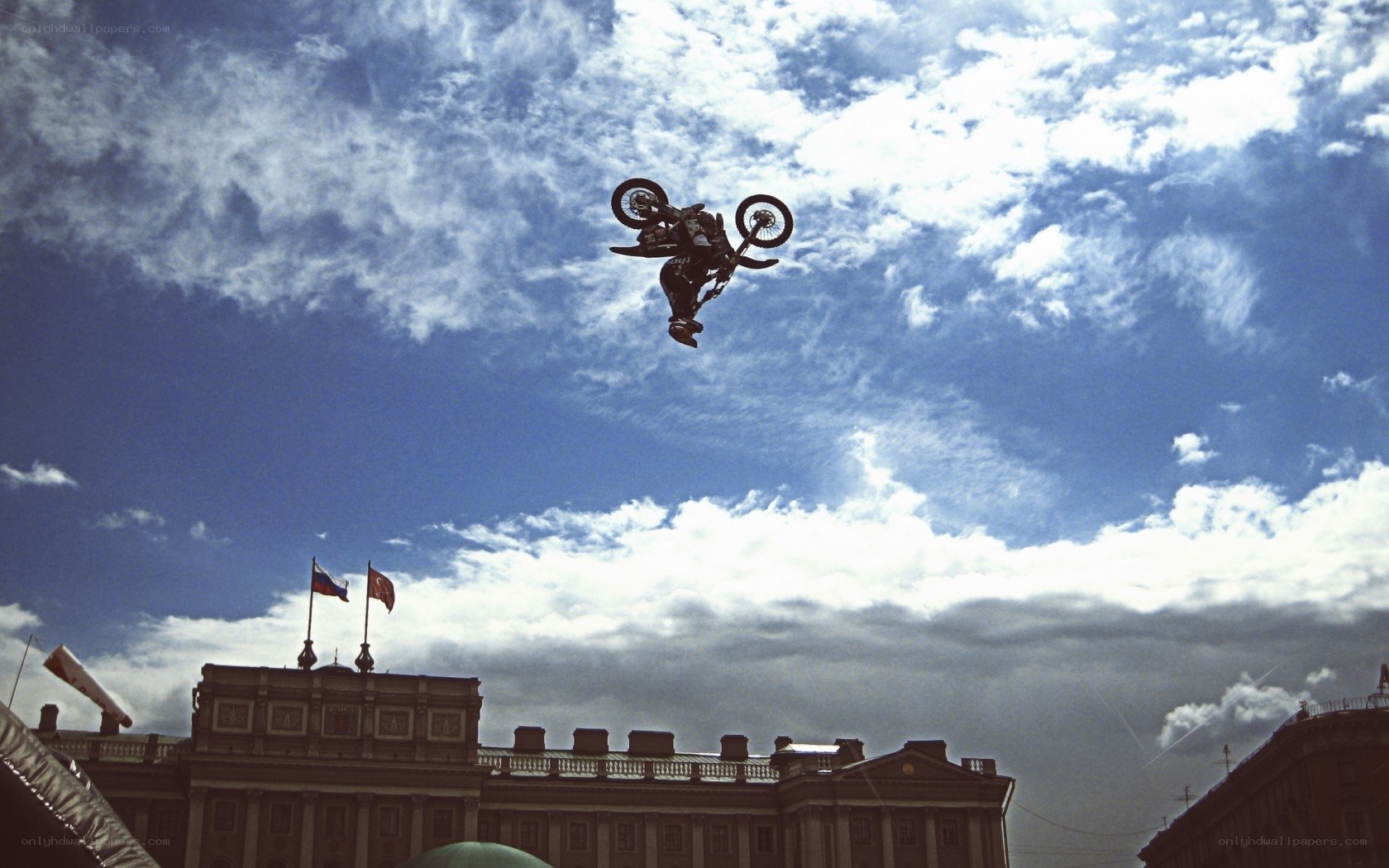 Motorcycle stunt in the sky