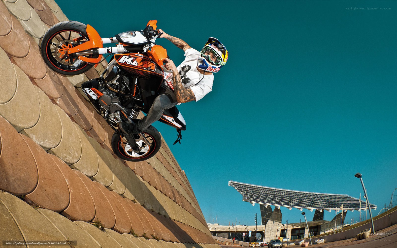 Motorcycle stunt on a slope